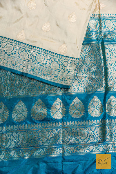 Advika- Off White- Turquoise Blue Banarasi Katan Silk Handwoven Saree