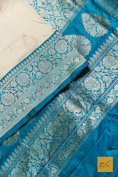 Advika- Off White- Turquoise Blue Banarasi Katan Silk Handwoven Saree