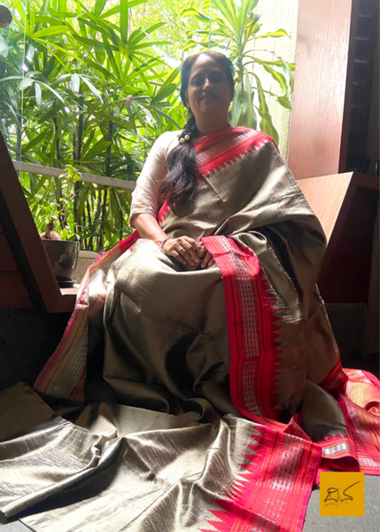 Chandravadana is a luxurious dupion silk saree with a beautiful grey and red colour combination. This saree is handwoven for a delicate, authentic temple border. A perfect choice for a special occasion or everyday grace.  Fabric-Raw(Dupion)Silk.