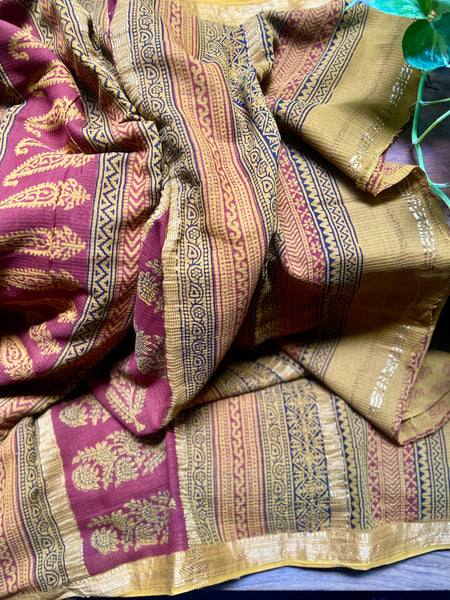 Step out in style with this hand printed Mustard Maheshwari saree! Crafted from silk cotton and printed in bold Bagh, Madhya pradesh designs, it's easy to drape and perfect for any special occasion. Soak up the compliments with this gorgeous, comfortable and dressy saree!