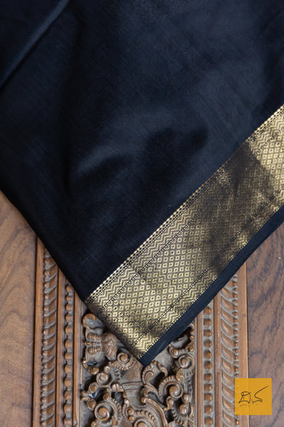 Indulge in the elegant look of our Gray-Black Maheshwari silk cotton saree. Perfect for both formal and casual occasions, this saree comes with a blouse for a complete look. Experience the benefits of comfort and style with this exquisite saree.