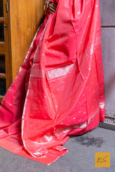 Expertly handwoven from a blend of silk and cotton, this Rose-Pink Maheshwari saree is a stunning piece of craftsmanship. The delicate rose-pink color and intricate design make it a perfect choice for any occasion.