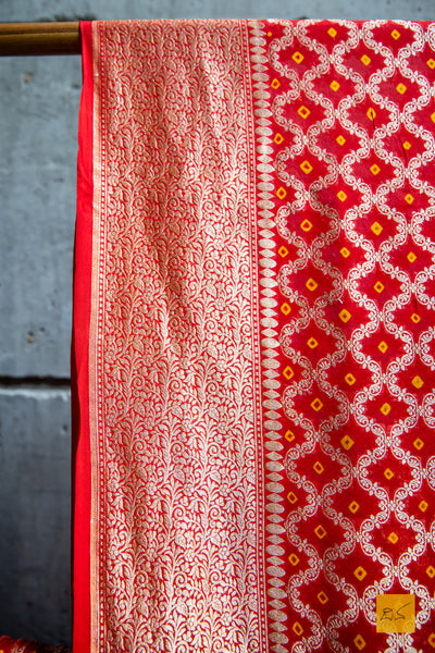 As the name suggests, it will be your loved one.  A banarasi georgette saree in red colour with bandhej. A saree apt for the upcoming weddings and festivals.