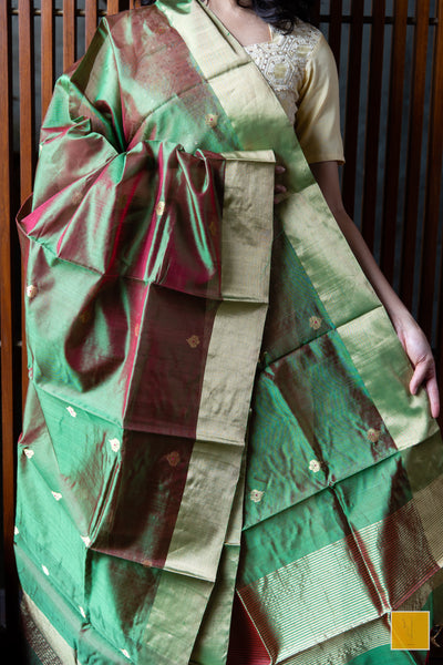 Green and and dual tone handwoven chanderi silk dupatta with buttas.  This dual tone Chanderi silk dupatta is an elegant one for your dupatta collection. A dupatta which can go well for both formal and informal gatherings. Needless to say that, it is soft and easy to drape.