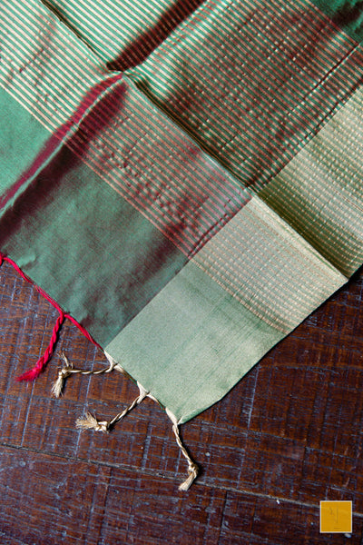 Green and and dual tone handwoven chanderi silk dupatta with buttas.  This dual tone Chanderi silk dupatta is an elegant one for your dupatta collection. A dupatta which can go well for both formal and informal gatherings. Needless to say that, it is soft and easy to drape.