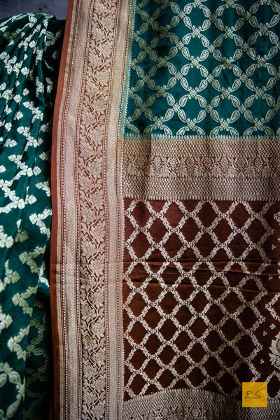 WE are a part of NATURE! A perfect banarasi georgette saree in shades of green and brown, for this wedding and festive season. This sari with zari jaal goes well with a gajra.