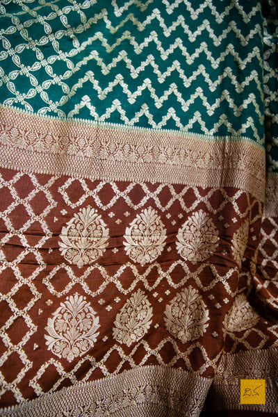 WE are a part of NATURE! A perfect banarasi georgette saree in shades of green and brown, for this wedding and festive season. This sari with zari jaal goes well with a gajra.