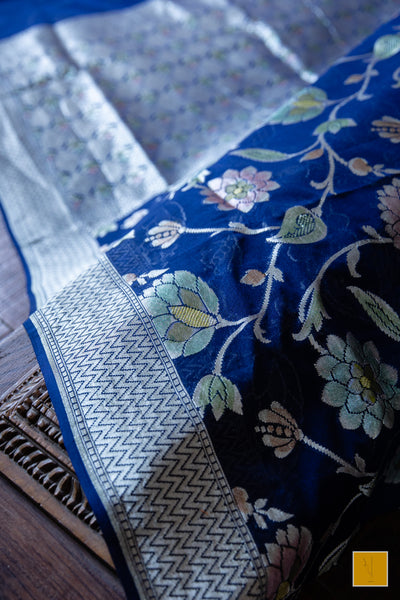 You are the admirer! Presenting this handpainted banarasi saree in shade of dark blue. Perfect for both formal and informal occasions.