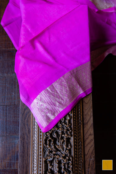 You are the shining one! Presenting this banarasi georgette saree in a pastel pink tone. The saree has hand painted jaal and suits both formal and informal occasions.
