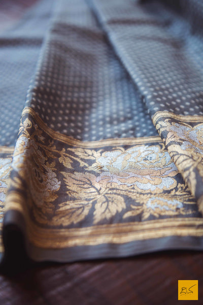 A lovely grey banarasi kora silk saree with small white buttas and exclusive sona and rupa border with rose buttas and pallu. New trend of Banarasi Saree designs, Banarasi Saree for artists, art lovers, architects, saree lovers, Saree connoisseurs, musicians, dancers, doctors, Banarasi silk saree, indian saree images, latest sarees with price, only saree images, new Banarasi saree design.
