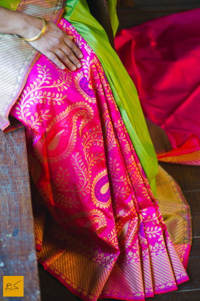 This is a gorgeous Banarasi silk handwoven Saree where the pink part has beautifully woven mango pattern zari work and it is in pure silk. The plain green part is of tussar silk. The blouse is in pink with woven border. New trend of Banarasi Saree designs, Banarasi Saree for artists, art lovers, architects, saree lovers, Saree connoisseurs, musicians, dancers, doctors, Banarasi silk saree, indian saree images, latest sarees with price, only saree images, new Banarasi saree design.