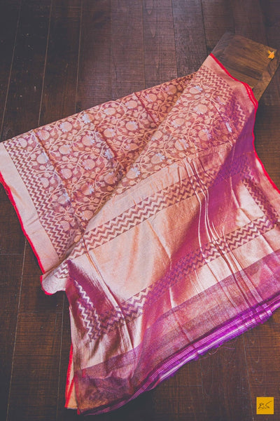 This is a gorgeous net Banarasi handwoven silk Saree with pink body and a red slevedge. New trend of Banarasi Saree designs, Banarasi Saree for artists, art lovers, architects, saree lovers, Saree connoisseurs, musicians, dancers, doctors, Banarasi silk saree, indian saree images, latest sarees with price, only saree images, new Banarasi saree design.