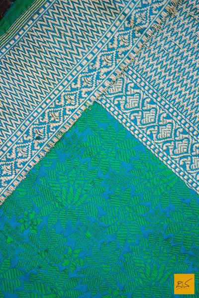 A wonderful banarasi silk tanchoi handwoven sari. The body has blue and green tanchoi work and the blue border has kadhwa motifs woven in antique zari and golden zari alternatively. The blouse has intricately woven zari brocade work with border. New trend of Banarasi Saree designs, Banarasi Saree for artists, art lovers, architects, saree lovers, Saree connoisseurs, musicians, dancers, doctors, Banarasi silk saree, indian saree images, latest sarees with price, only saree images, new Banarasi saree design.