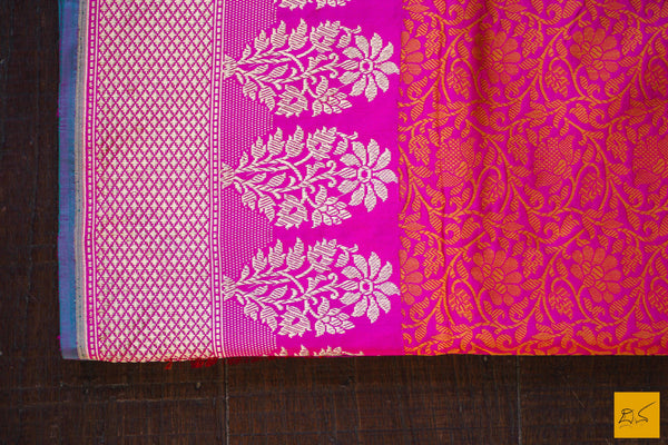 This is a gorgeous Banarasi silk Saree with pink body and has orange tanchoi work and the border has woven moghul motifs in kadhwa style. The blouse has intricately woven zari brocade work. New trend of Banarasi Saree designs, Banarasi Saree for artists, art lovers, architects, saree lovers, Saree connoisseurs, musicians, dancers, doctors, Banarasi silk saree, indian saree images, latest sarees with price, only saree images, new Banarasi saree design.