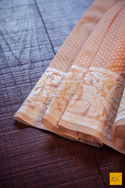 A lovely banarasi kora silk organza handwoven saree with white cut work buttas and exquisitely woven sona rupa border, pallu. Elegant and classy. New trend of Banarasi Saree designs, Banarasi Saree for artists, art lovers, architects, saree lovers, Saree connoisseurs, musicians, dancers, doctors, Banarasi silk saree, indian saree images, latest sarees with price, only saree images, new Banarasi saree design.