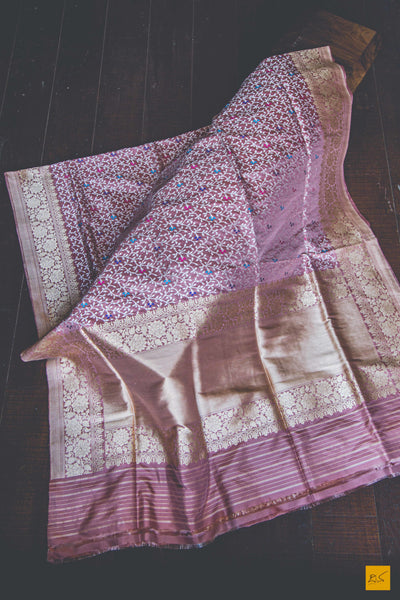 This is a gorgeous Banarasi Handwoven Silk Saree withmeena patola all over the body. The saree has a golden phulkari border. The meena work is so exquisite that it makes the saree adorable. The blouse is of rose pink colour with border. New trend of Banarasi Saree designs, Banarasi Saree for artists, art lovers, architects, saree lovers, Saree connoisseurs, musicians, dancers, doctors, Banarasi silk saree, indian saree images, latest sarees with price, only saree images, new Banarasi saree design.