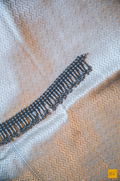 This wonderful Banarasi Katan Silk Saree has it's body covered in Gray colour. New trend of Banarasi Saree designs, Banarasi Saree for artists, art lovers, architects, saree lovers, Saree connoisseurs, musicians, dancers, doctors, Banarasi silk saree, indian saree images, latest sarees with price, only saree images, new Banarasi saree design.