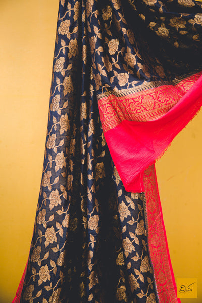 A classy combination of black and red coming together in this black and red banarasi munga silk dupatta, statement piece