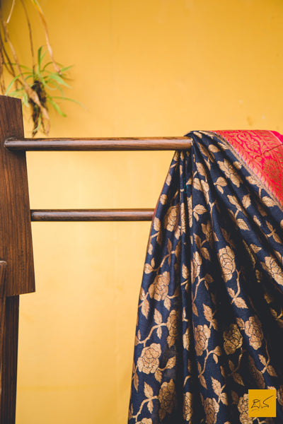 A classy combination of black and red coming together in this black and red banarasi munga silk dupatta, statement piece