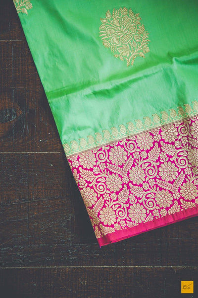 This is a beautiful katan silk banarasi sari with a pink border and kadhwa motifs. It's speciality is its Kadhiyal border. It is dyed and woven with different colour which makes it the authentic Kadhiyal. New trend of Banarasi Saree designs, Banarasi Saree for artists, art lovers, architects, saree lovers, Saree connoisseurs, musicians, dancers, doctors, Banarasi Katan silk saree, indian saree images, latest sarees with price, only saree images, new Banarasi saree design.