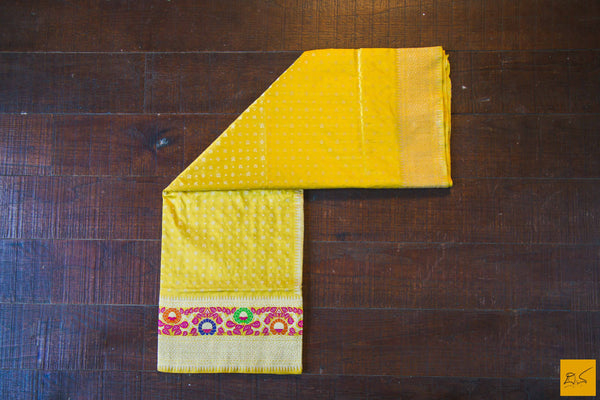 This is a gorgeous Banarasi Silk Saree with meenakari phulari border and pallu. The phulari border is so exquisite that it makes the saree stand out. The saree has small star meena buttas. The blouse is yellow in colour with the border. New trend of Banarasi Saree designs, Banarasi Saree for artists, art lovers, architects, saree lovers, Saree connoisseurs, musicians, dancers, doctors, Banarasi silk saree, indian saree images, latest sarees with price, only saree images, new Banarasi saree design.