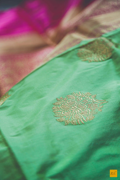 This is a beautiful katan silk banarasi sari with a pink border and kadhwa motifs. It's speciality is its Kadhiyal border. It is dyed and woven with different colour which makes it the authentic Kadhiyal. New trend of Banarasi Saree designs, Banarasi Saree for artists, art lovers, architects, saree lovers, Saree connoisseurs, musicians, dancers, doctors, Banarasi Katan silk saree, indian saree images, latest sarees with price, only saree images, new Banarasi saree design.