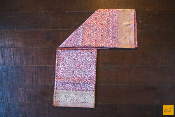 This is a gorgeous Banarasi Handwoven Silk Saree withmeena patola all over the body. The saree has a golden phulkari border. The meena work is so exquisite that it makes the saree adorable. The blouse is of rose pink colour with border. New trend of Banarasi Saree designs, Banarasi Saree for artists, art lovers, architects, saree lovers, Saree connoisseurs, musicians, dancers, doctors, Banarasi silk saree, indian saree images, latest sarees with price, only saree images, new Banarasi saree design.
