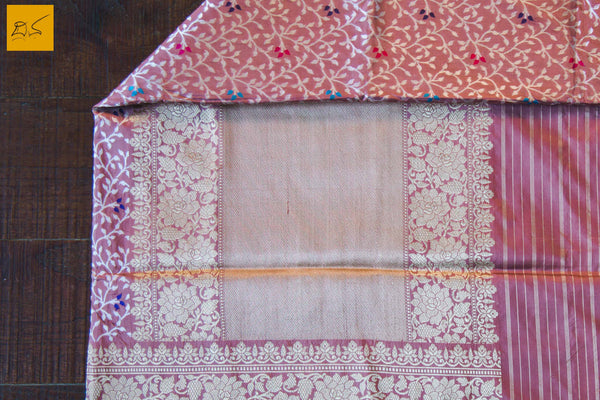 This is a gorgeous Banarasi Handwoven Silk Saree withmeena patola all over the body. The saree has a golden phulkari border. The meena work is so exquisite that it makes the saree adorable. The blouse is of rose pink colour with border. New trend of Banarasi Saree designs, Banarasi Saree for artists, art lovers, architects, saree lovers, Saree connoisseurs, musicians, dancers, doctors, Banarasi silk saree, indian saree images, latest sarees with price, only saree images, new Banarasi saree design.
