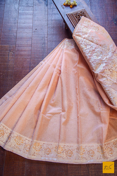 A lovely banarasi kora silk organza handwoven saree with white cut work buttas and exquisitely woven sona rupa border, pallu. Elegant and classy. New trend of Banarasi Saree designs, Banarasi Saree for artists, art lovers, architects, saree lovers, Saree connoisseurs, musicians, dancers, doctors, Banarasi silk saree, indian saree images, latest sarees with price, only saree images, new Banarasi saree design.