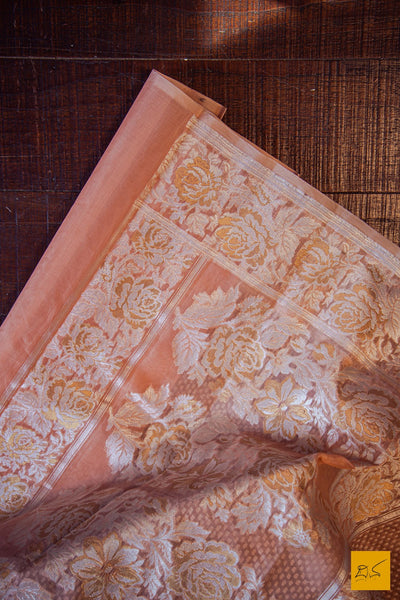 A lovely banarasi kora silk organza handwoven saree with white cut work buttas and exquisitely woven sona rupa border, pallu. Elegant and classy. New trend of Banarasi Saree designs, Banarasi Saree for artists, art lovers, architects, saree lovers, Saree connoisseurs, musicians, dancers, doctors, Banarasi silk saree, indian saree images, latest sarees with price, only saree images, new Banarasi saree design.