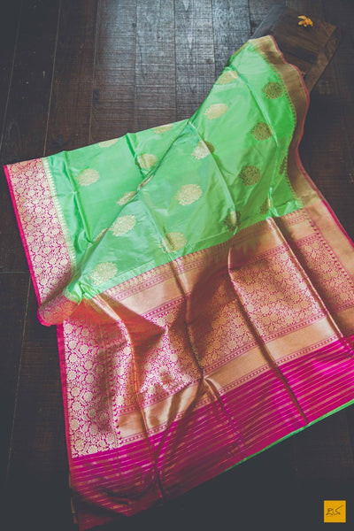 This is a beautiful katan silk banarasi sari with a pink border and kadhwa motifs. It's speciality is its Kadhiyal border. It is dyed and woven with different colour which makes it the authentic Kadhiyal. New trend of Banarasi Saree designs, Banarasi Saree for artists, art lovers, architects, saree lovers, Saree connoisseurs, musicians, dancers, doctors, Banarasi Katan silk saree, indian saree images, latest sarees with price, only saree images, new Banarasi saree design.