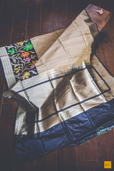 A banarasi saree with matka silk body and pure katan silk border. The saree is special for its lovely meenakaeri border. This trendy banarasi saree has a katan silk border, pallu and blouse. The lower border has lovely colourful jaal weaving in multiple colours.  This saree goes well for both formal and informal gatherings. Accessorise this saree with a gajra and pearl accessories to complete the look.