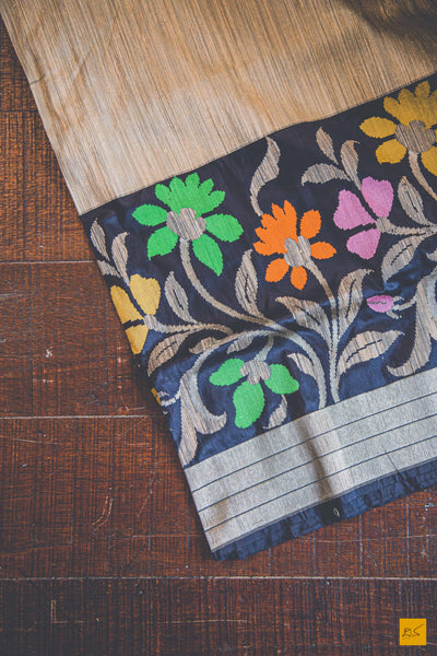A banarasi saree with matka silk body and pure katan silk border. The saree is special for its lovely meenakaeri border. This trendy banarasi saree has a katan silk border, pallu and blouse. The lower border has lovely colourful jaal weaving in multiple colours.  This saree goes well for both formal and informal gatherings. Accessorise this saree with a gajra and pearl accessories to complete the look.