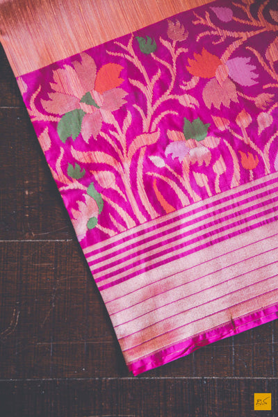 Peach and Pink.  A banarasi saree with matka silk body and pure katan silk border. The saree is special for its lovely meenakari border. This trendy banarasi saree has a katan silk border, pallu and blouse. The lower border has lovely colourful jaal weaving in multiple colours.  This saree goes well for both formal and informal gatherings. Accessorise this saree with a gajra and pearl accessories to complete the look.