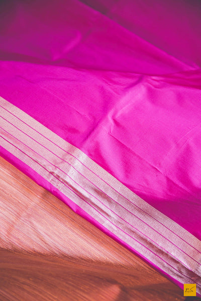Peach and Pink.  A banarasi saree with matka silk body and pure katan silk border. The saree is special for its lovely meenakari border. This trendy banarasi saree has a katan silk border, pallu and blouse. The lower border has lovely colourful jaal weaving in multiple colours.  This saree goes well for both formal and informal gatherings. Accessorise this saree with a gajra and pearl accessories to complete the look.