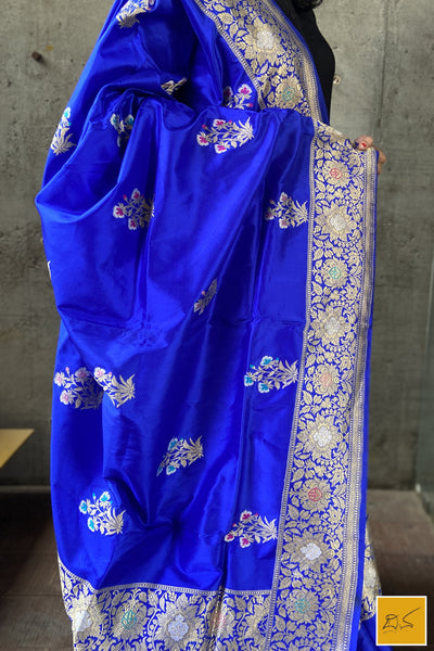 This is a gorgeous a Blue banarasi katan silk handwoven dupatta with kadhwa meenakari buttas. New trend of Silk Dupatta designs, Silk Dupatta for artists, art lovers, architects, dupatta lovers, Dupatta connoisseurs, musicians, dancers, doctors, Silk dupatta, indian dupatta images, latest dupattas with price, only dupatta images, new Silk dupatta design.