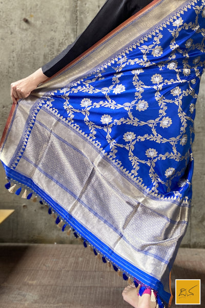 This is a gorgeous a blue banarasi katan silk handwoven dupatta with kadhwa meenakari buttas. New trend of Silk Dupatta designs, Silk Dupatta for artists, art lovers, architects, dupatta lovers, Dupatta connoisseurs, musicians, dancers, doctors, Silk dupatta, indian dupatta images, latest dupattas with price, only dupatta images, new Silk dupatta design.