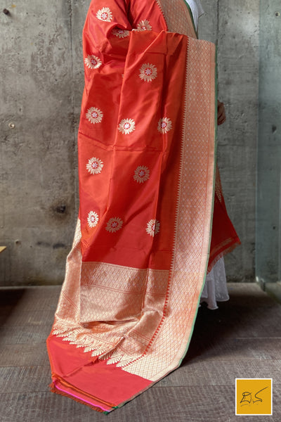 This is a gorgeous an orange-red banarasi katan silk handwoven dupatta with sona rupa buttas. New trend of Silk Dupatta designs, Silk Dupatta for artists, art lovers, architects, dupatta lovers, Dupatta connoisseurs, musicians, dancers, doctors, Silk dupatta, indian dupatta images, latest dupattas with price, only dupatta images, new Silk dupatta design.