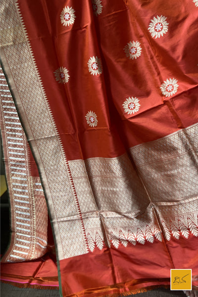 This is a gorgeous an orange-red banarasi katan silk handwoven dupatta with sona rupa buttas. New trend of Silk Dupatta designs, Silk Dupatta for artists, art lovers, architects, dupatta lovers, Dupatta connoisseurs, musicians, dancers, doctors, Silk dupatta, indian dupatta images, latest dupattas with price, only dupatta images, new Silk dupatta design.