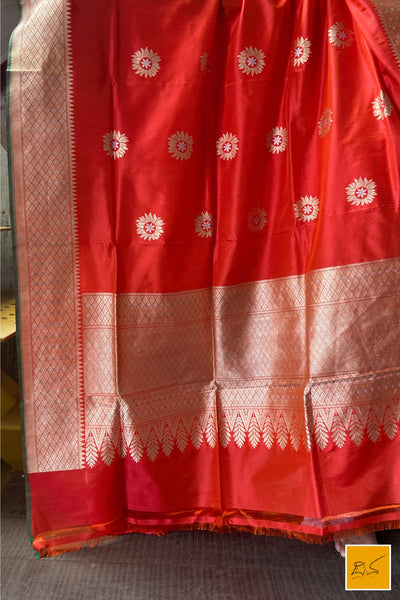 This is a gorgeous an orange-red banarasi katan silk handwoven dupatta with sona rupa buttas. New trend of Silk Dupatta designs, Silk Dupatta for artists, art lovers, architects, dupatta lovers, Dupatta connoisseurs, musicians, dancers, doctors, Silk dupatta, indian dupatta images, latest dupattas with price, only dupatta images, new Silk dupatta design.