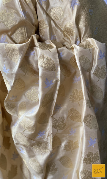 This is a gorgeous ivory gold banarasi katan silk handwoven dupatta with intricately woven buttas in sona rupa zari. New trend of Silk Dupatta designs, Silk Dupatta for artists, art lovers, architects, dupatta lovers, Dupatta connoisseurs, musicians, dancers, doctors, Silk dupatta, indian dupatta images, latest dupattas with price, only dupatta images, new Silk dupatta design.