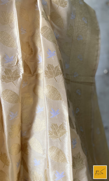 This is a gorgeous ivory gold banarasi katan silk handwoven dupatta with intricately woven buttas in sona rupa zari. New trend of Silk Dupatta designs, Silk Dupatta for artists, art lovers, architects, dupatta lovers, Dupatta connoisseurs, musicians, dancers, doctors, Silk dupatta, indian dupatta images, latest dupattas with price, only dupatta images, new Silk dupatta design.