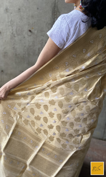 This is a gorgeous ivory gold banarasi katan silk handwoven dupatta with intricately woven buttas in sona rupa zari. New trend of Silk Dupatta designs, Silk Dupatta for artists, art lovers, architects, dupatta lovers, Dupatta connoisseurs, musicians, dancers, doctors, Silk dupatta, indian dupatta images, latest dupattas with price, only dupatta images, new Silk dupatta design.