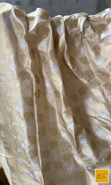 This is a gorgeous ivory gold banarasi katan silk handwoven dupatta with intricately woven buttas in sona rupa zari. New trend of Silk Dupatta designs, Silk Dupatta for artists, art lovers, architects, dupatta lovers, Dupatta connoisseurs, musicians, dancers, doctors, Silk dupatta, indian dupatta images, latest dupattas with price, only dupatta images, new Silk dupatta design.