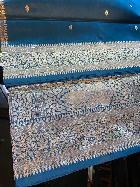 Do you recall a traditional Banarasi weave belonging to your grandmother in this particular hue and similar pattern?  Presenting this blue banarasi saree with kadhwa buttas and meenakari border and pallu. Needless to say, very soft and easy to drape.   Fabric- Katan Silk