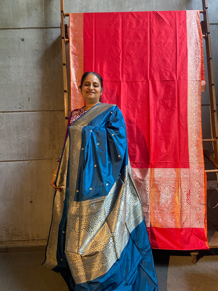 Do you recall a traditional Banarasi weave belonging to your grandmother in this particular hue and similar pattern?  Presenting this blue banarasi saree with kadhwa buttas and meenakari border and pallu. Needless to say, very soft and easy to drape.   Fabric- Katan Silk