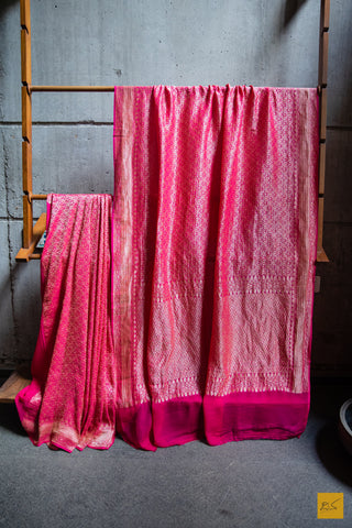 SOWGANDHIKA is a beautiful and luxurious saree crafted with pink georgette and fine brocade weaving. Soft and lightweight, it's easy to drape and perfect for festive occasions. Make an elegant statement with its timeless look and feel.  Fabric- Georgette  Colour- Pink