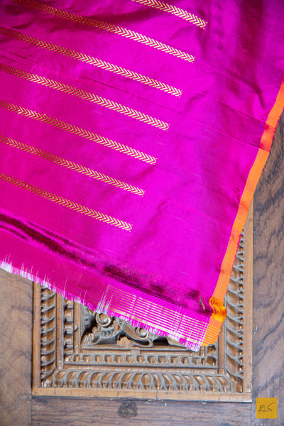 Exquisitely handwoven in Banarasi silk, this rani pink saree is perfect for any formal occasion. Its small motifs woven in cutwork style adds a stylish, traditional charm, while its luxuriously soft and effortless drape provides comfort and elegance.