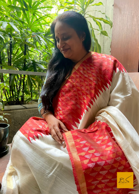 The Swaratmika saree is exquisitely designed in dupion silk, handwoven to perfection. Its classic combination of red and white is given an elegant edge with a temple border. The perfect balance of traditional and contemporary, this saree exudes class and sophistication.