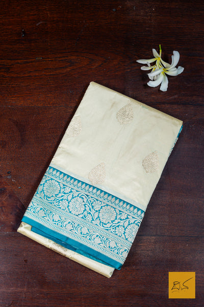 Advika- Off White- Turquoise Blue Banarasi Katan Silk Handwoven Saree